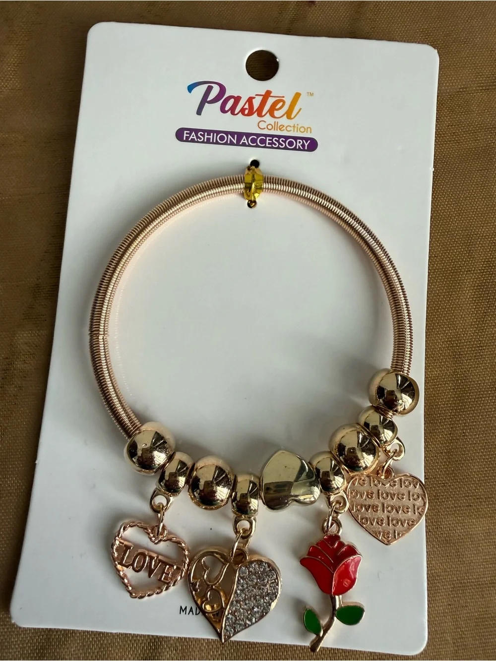 Gold-Tone Charm Bracelet with Red Rose and Heart Charms